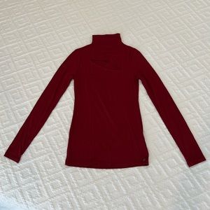 Guess stretch top with sexy cut-out on chest.